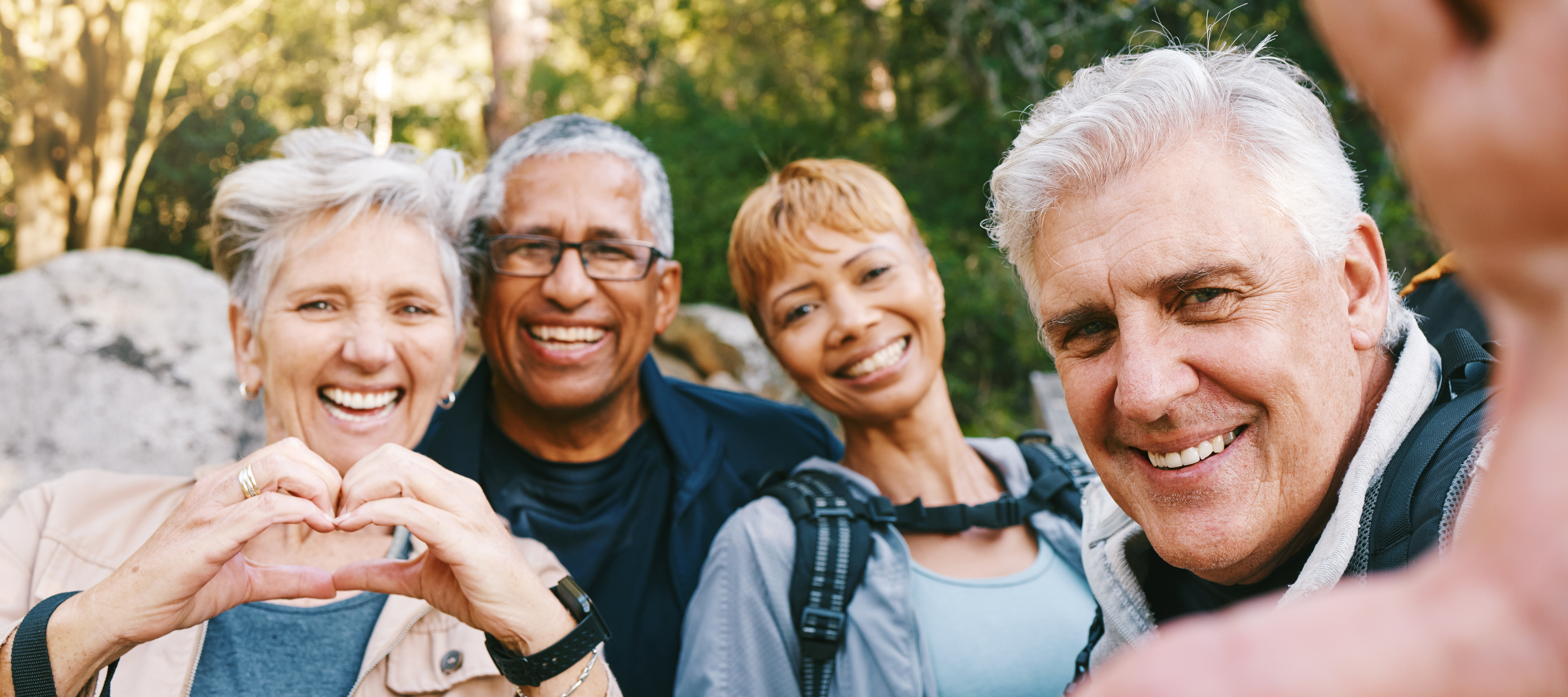 elderly people taking a picture